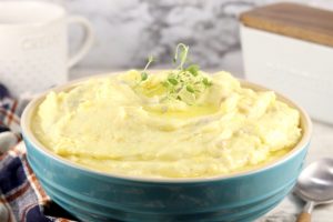 Creamy Mashed Potatoes in a blue bowl