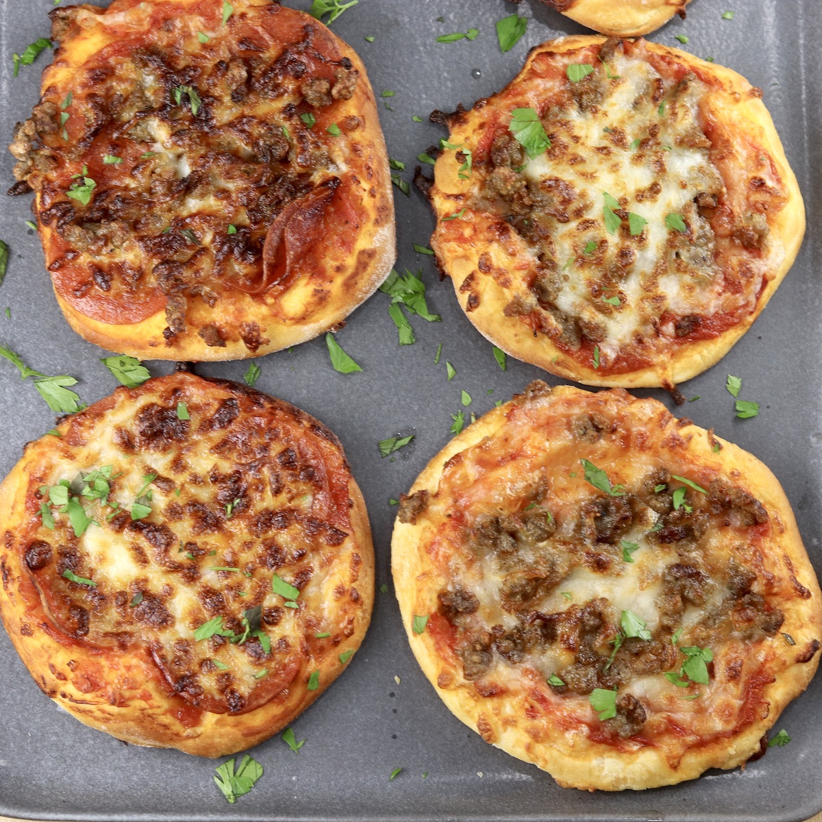 https://www.missinthekitchen.com/wp-content/uploads/2020/09/Air-Fryer-Mini-Pizza-Recipe-Image-F.jpeg