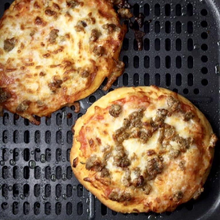 Mini pizzas with sausage.