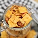 Cheez-It snack mix in a jar with pretzels and nuts.