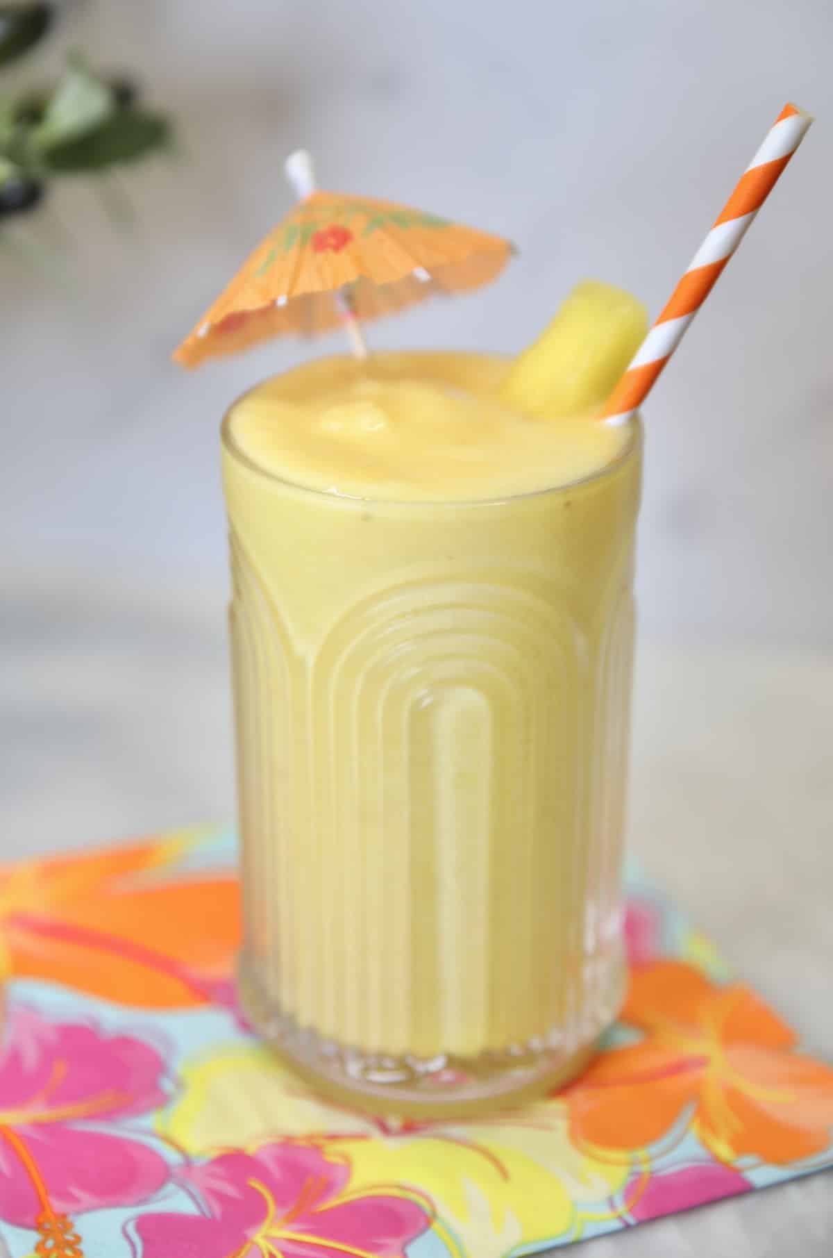 Pineapple smoothie in a glass.