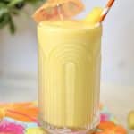 Glass with pineapple smoothie.