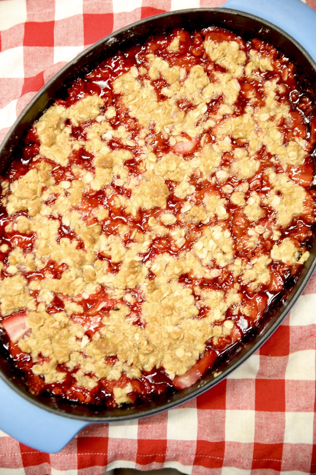 Strawberry fruit crisp with oat topping.