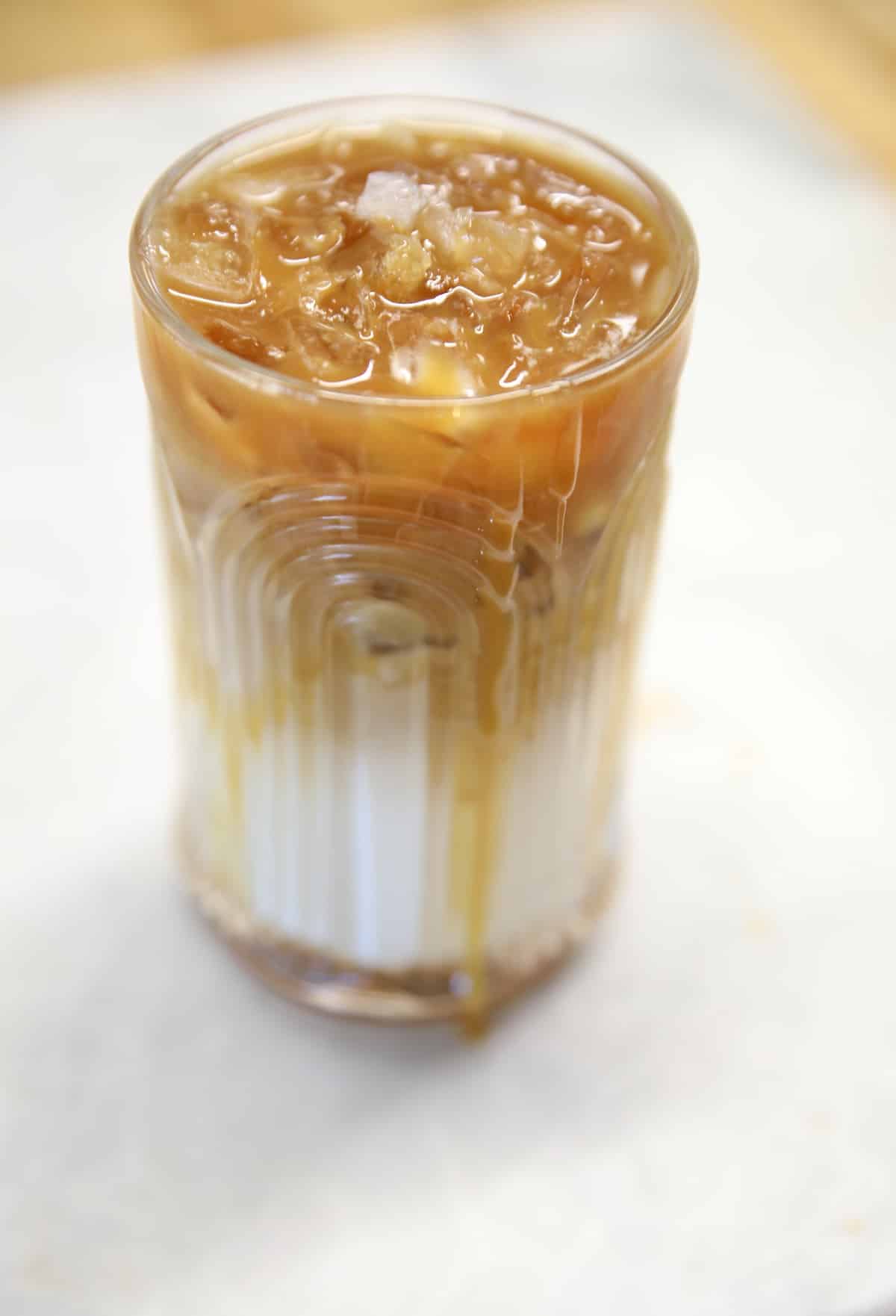 Iced caramel macchiato in a glass.