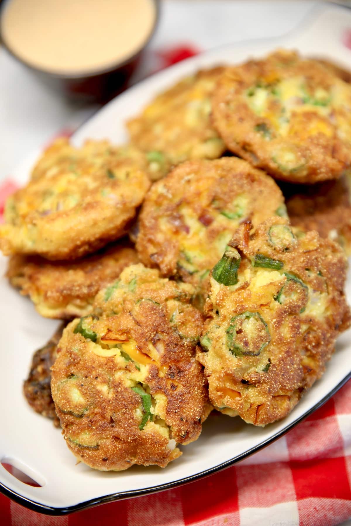 Crispy okra fritters on a platter.