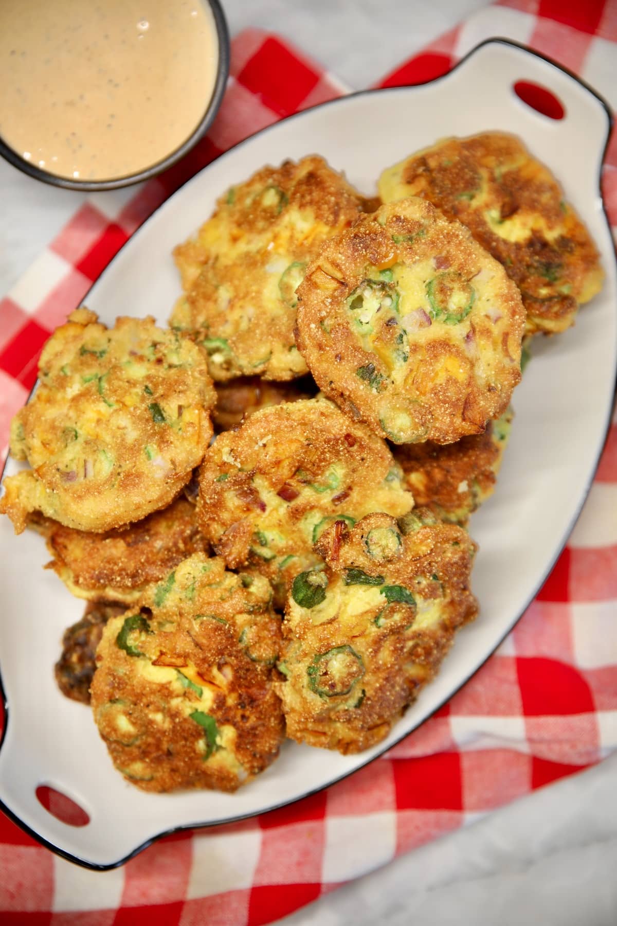 Okra fritters on a platter.