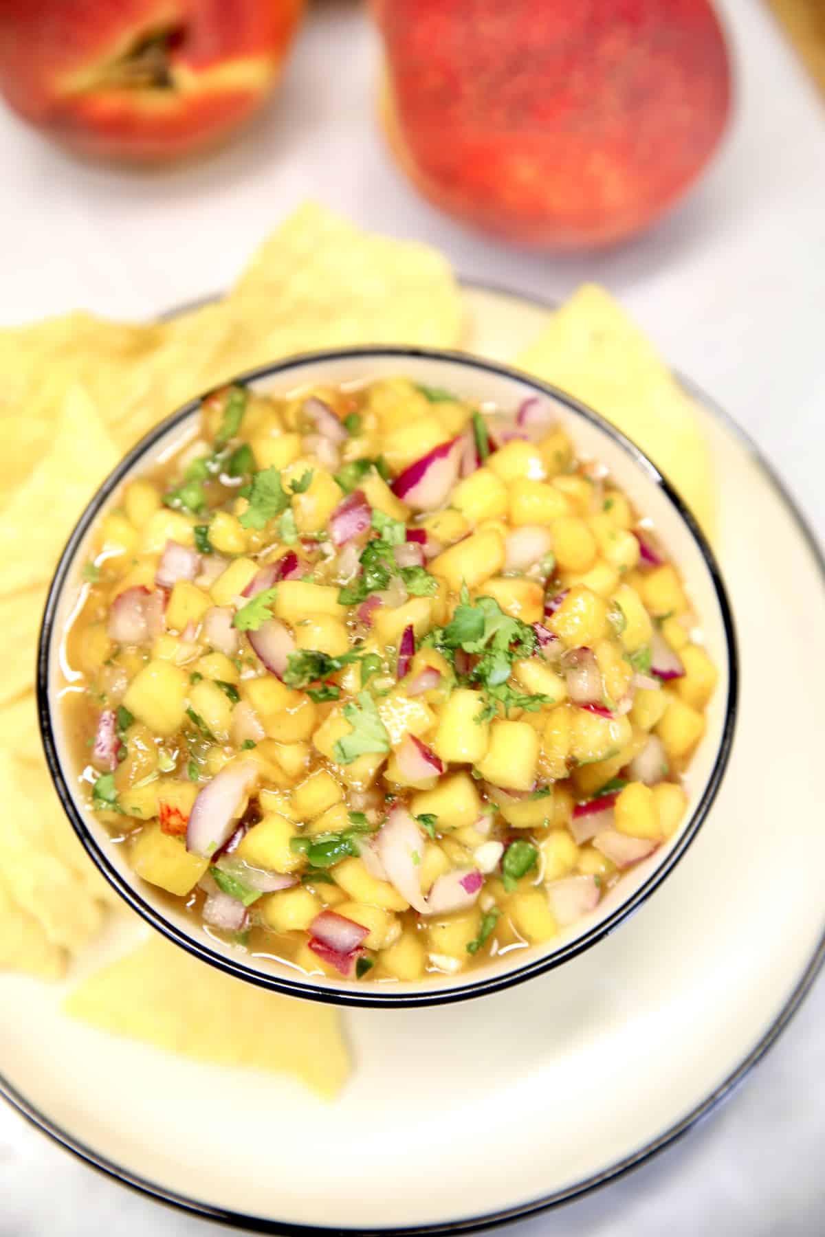 Bowl of fresh peach salsa.