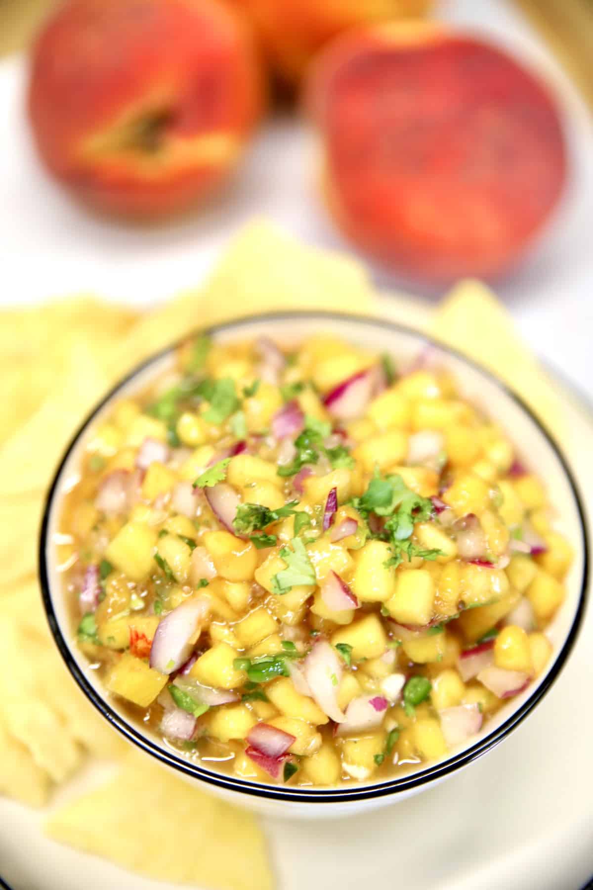 Bowl of fresh peach salsa.