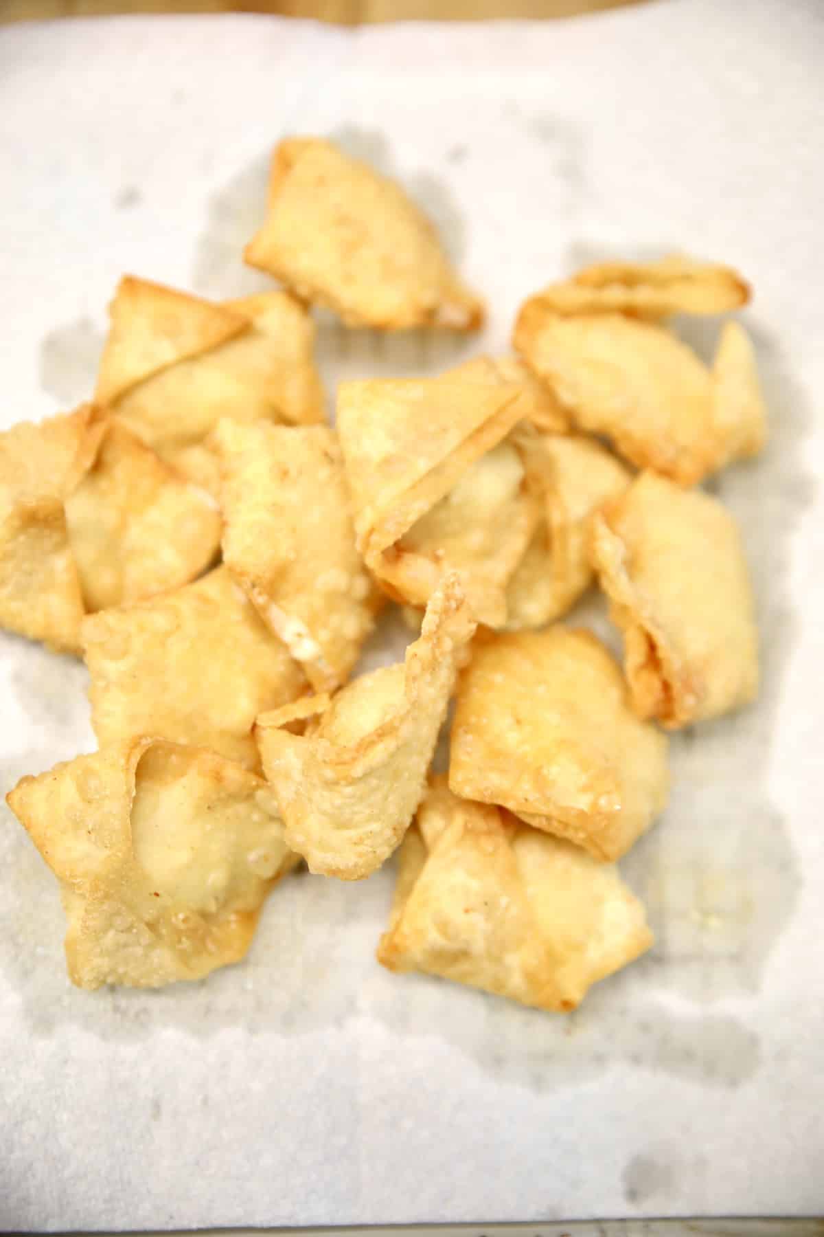 Shrimp rangoon on a paper towel.