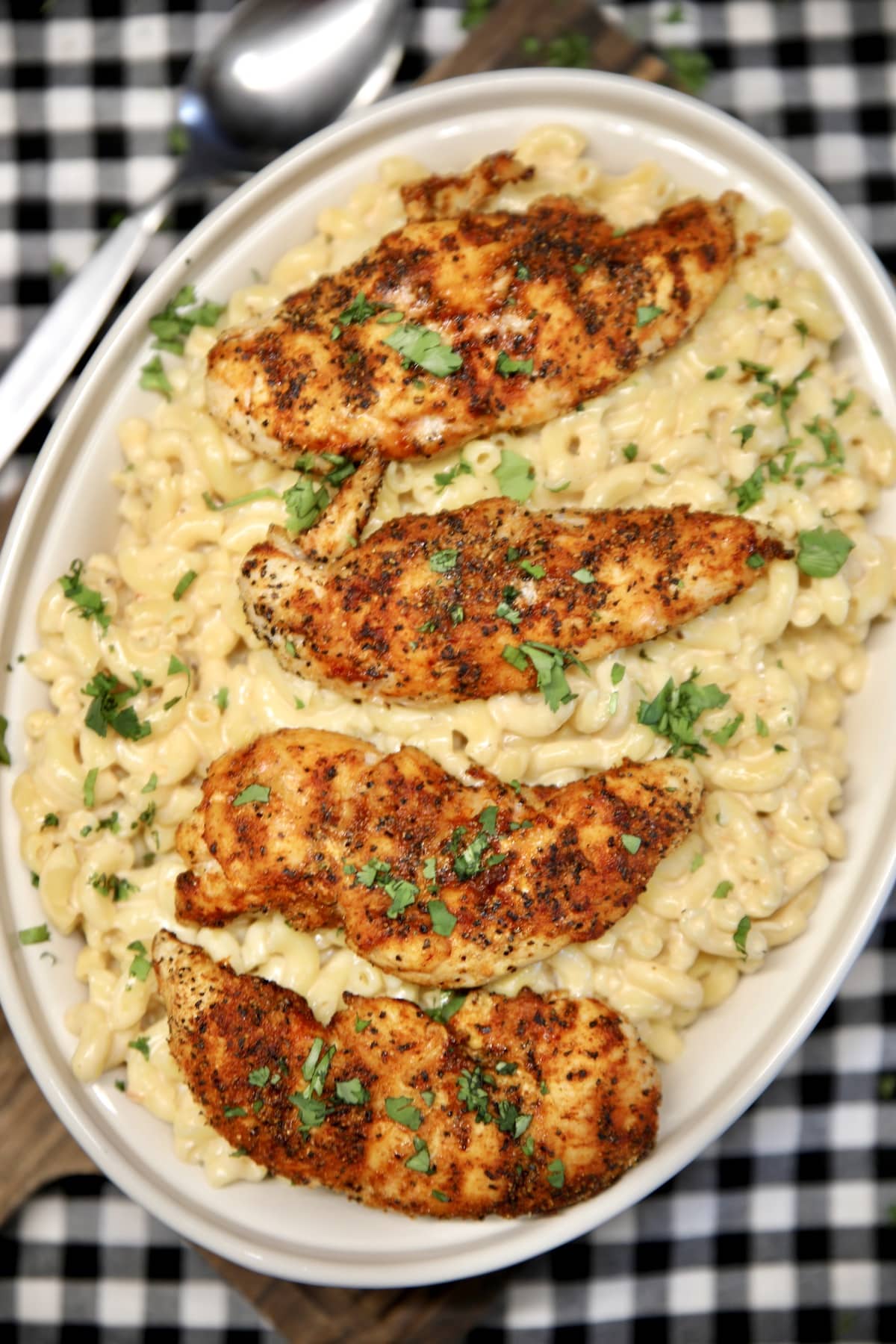 Casserole with mac and cheese with chicken tenders.