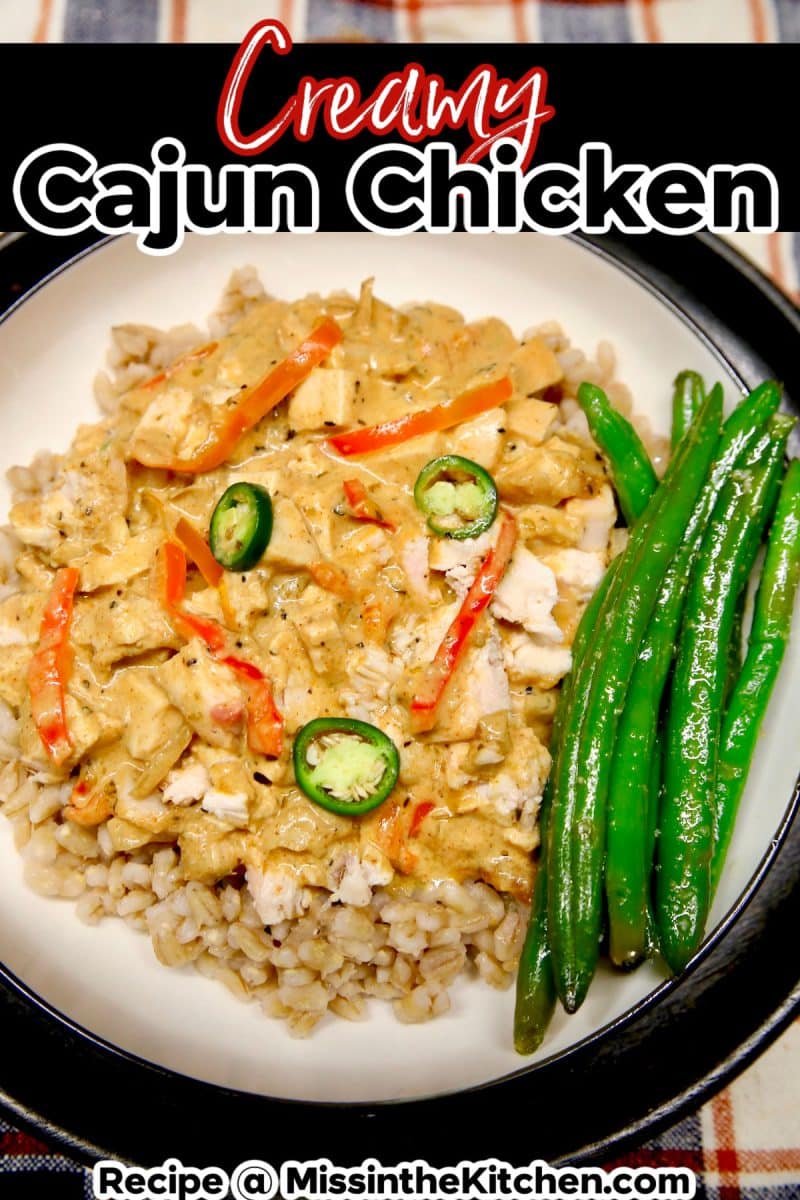 Chicken in cream sauce in a bowl with green beans.