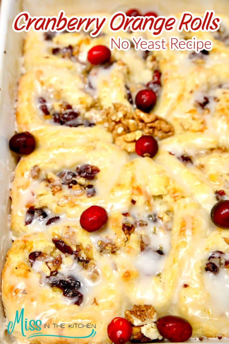 Cranberry Orange Rolls in a pan with text overlay.