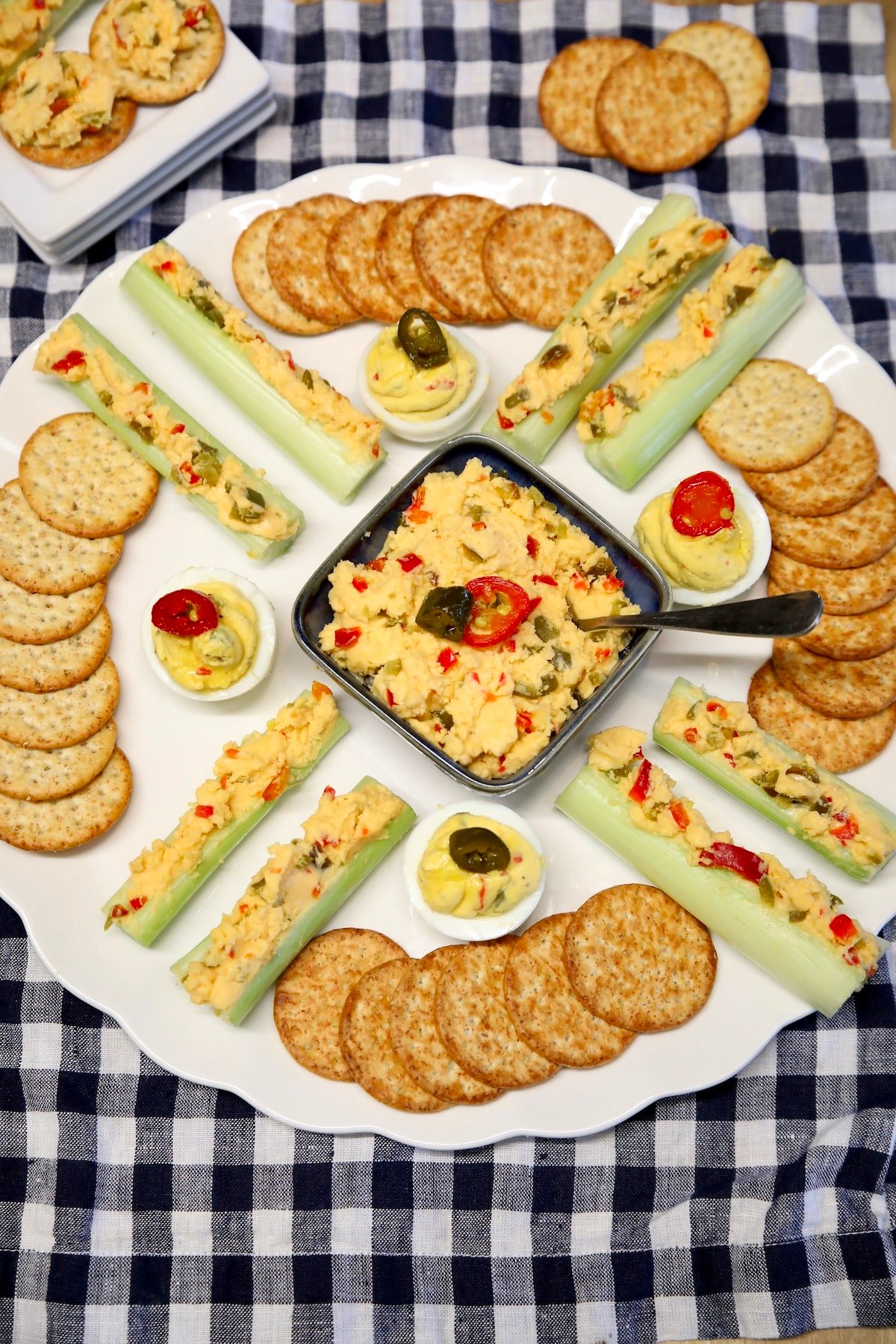 Platter of jalapeno cheese spread, crackers, stuffed celery.