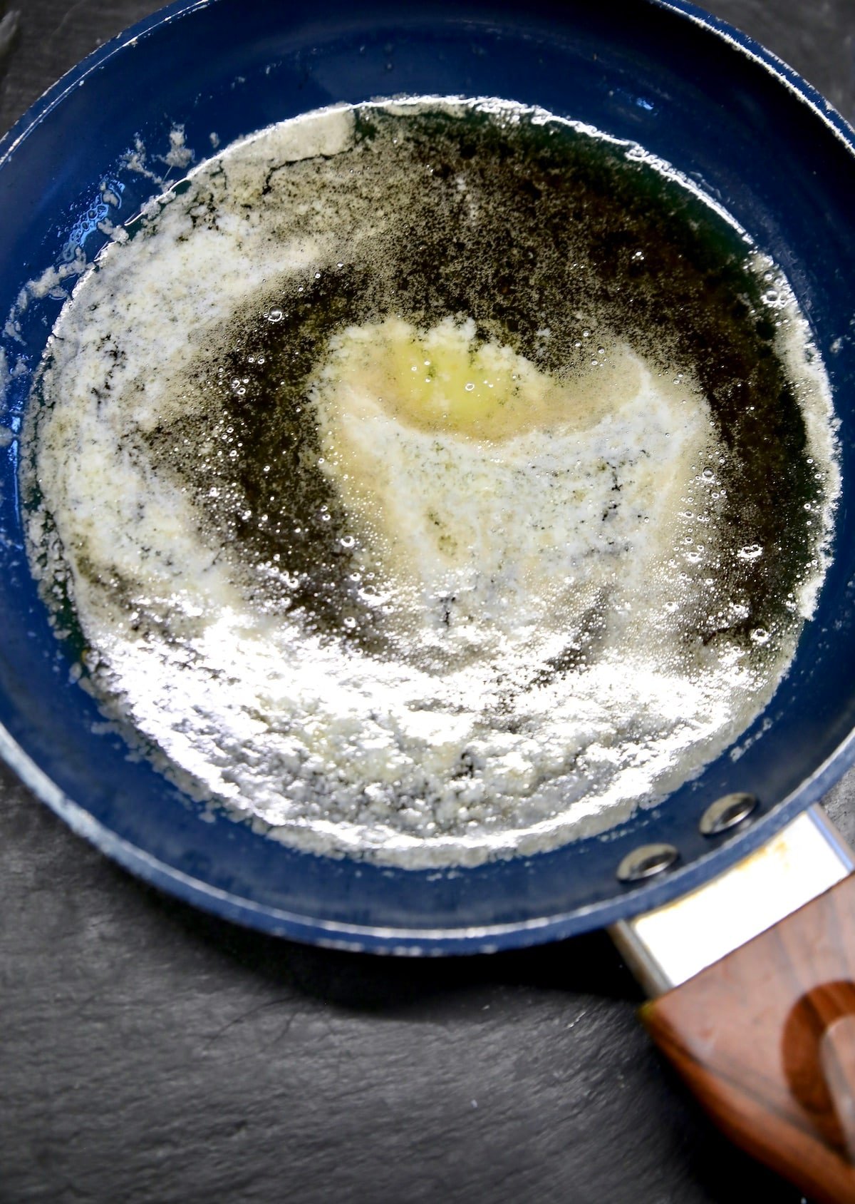 Skillet with maple syrup and butter.