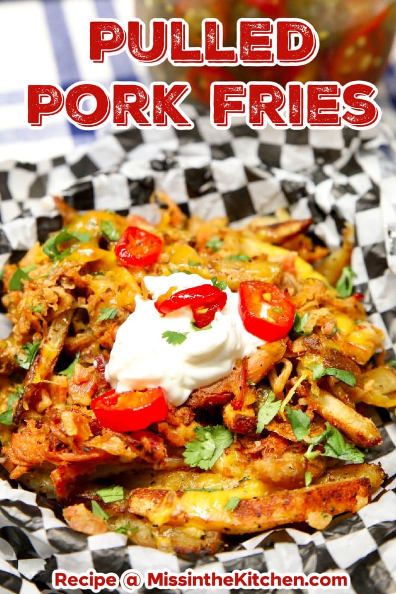 Pulled pork cheese fries on a plate - text overlay.