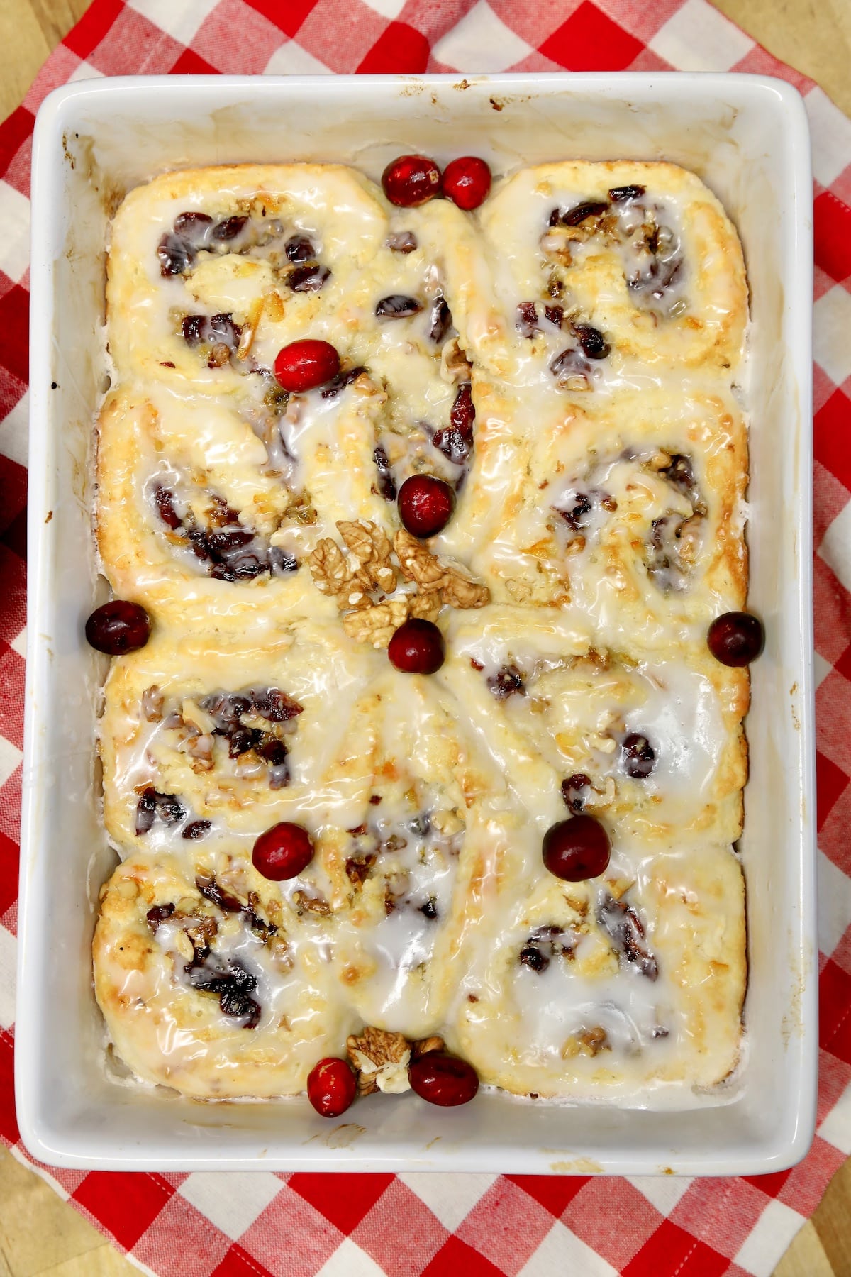 Cranberry orange sweet rolls in a pan.